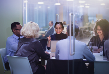 people working in conference room